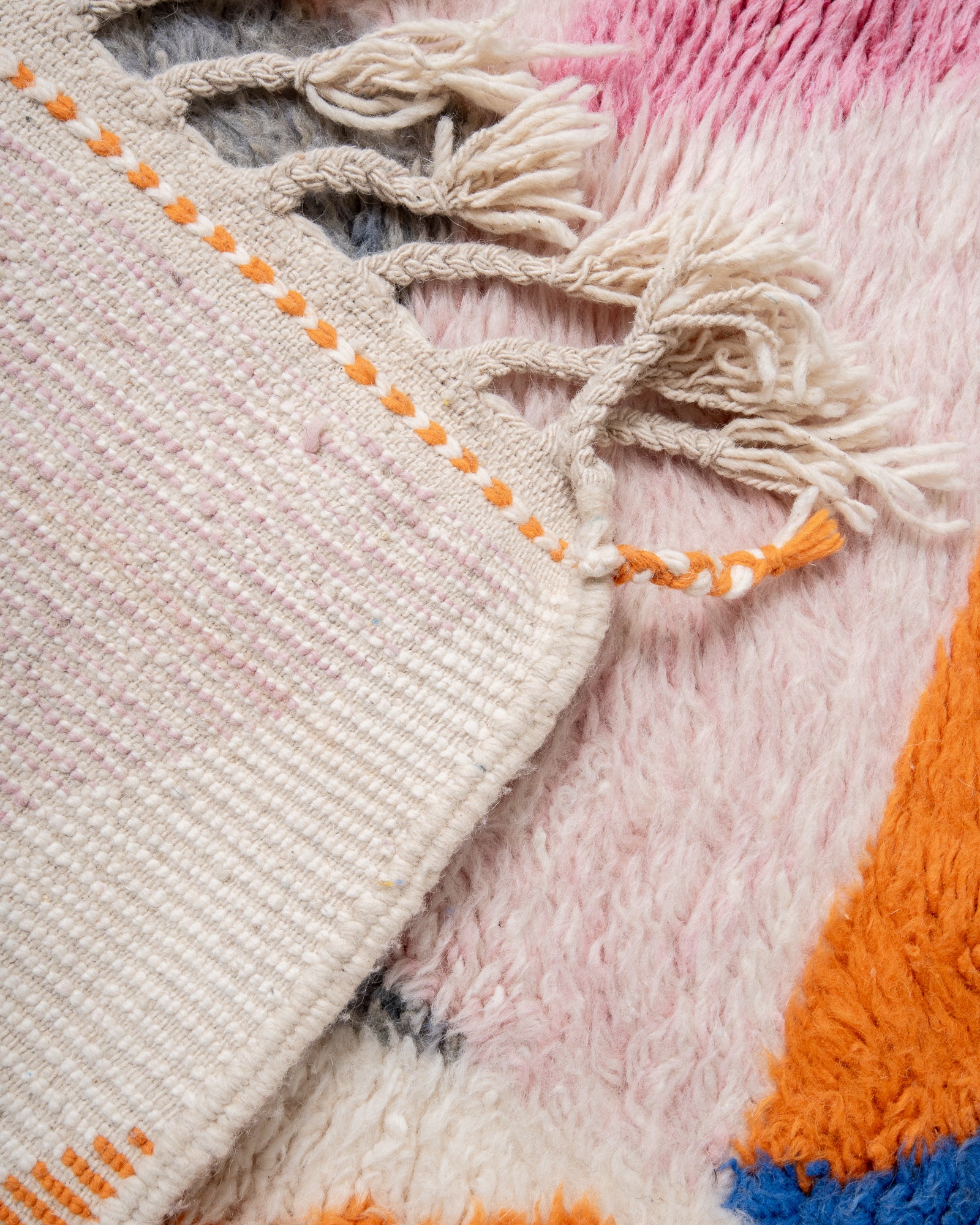 Modern, designer, handcrafted Berber rug from Morocco. Beniourain carpet with beautiful colours and patterns and fluffy wool texture.